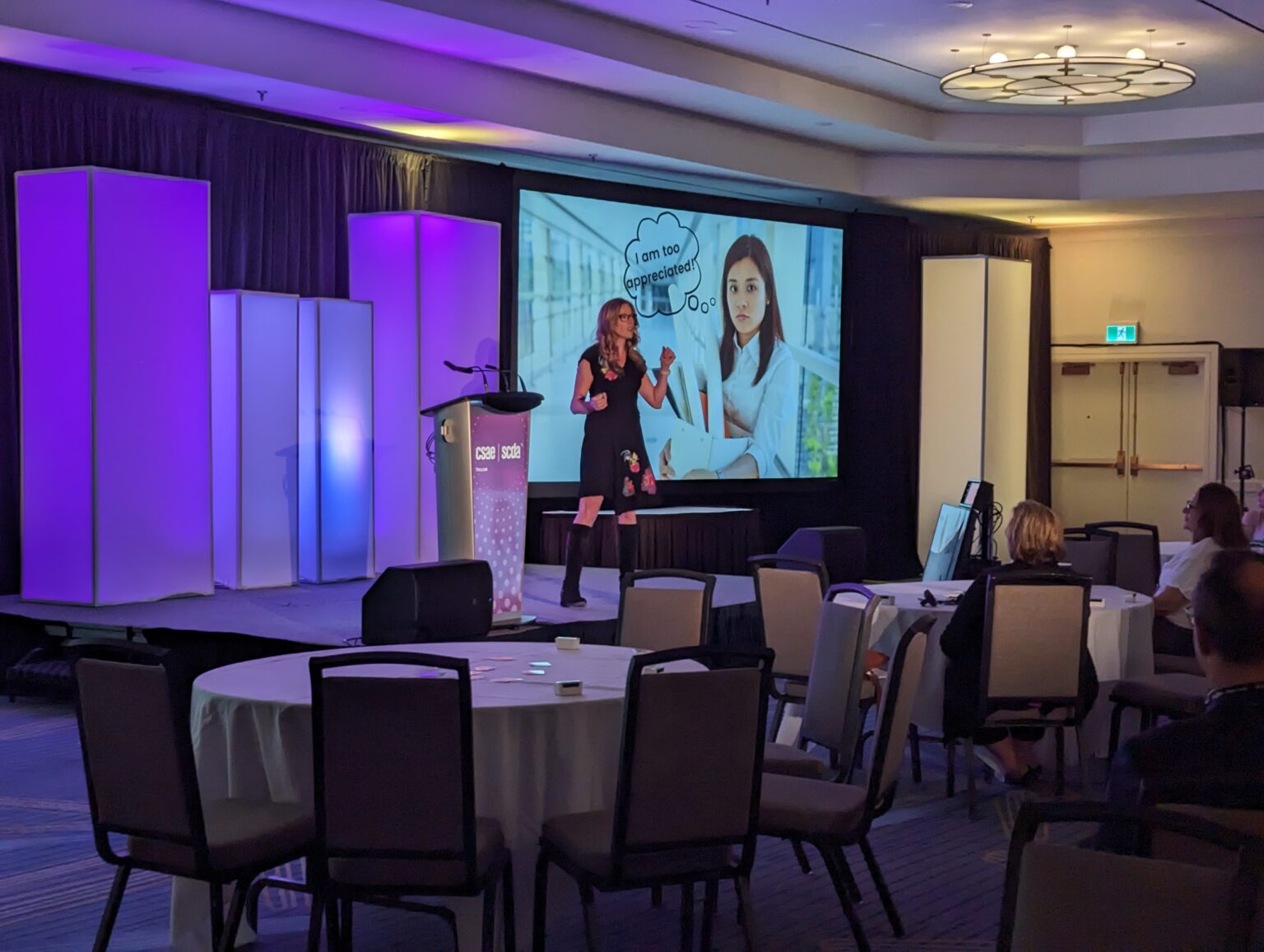 Speaker coach Sarah on stage
