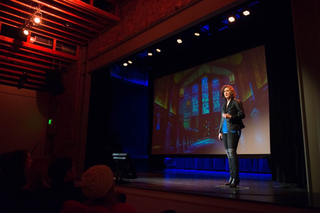 Meagan O'Nan on a conference stage