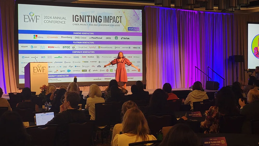 Erika Casupanan delivering a keynote at the Executive Women’s Forum