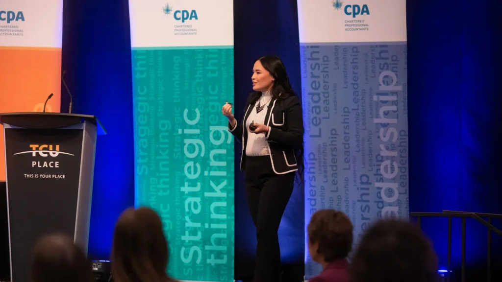 Cherry Rose Tan on stage at CPA Manitoba